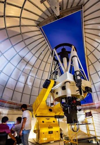 Students conducting research with the Ortega telescope